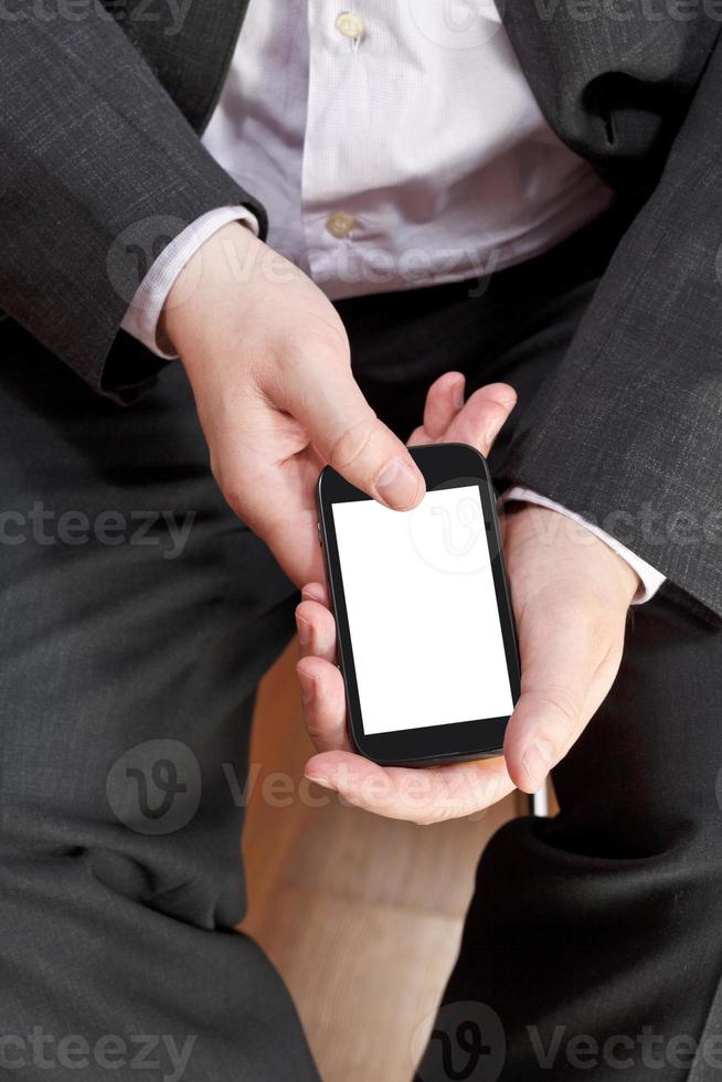 above view of smartphone in male hands photo