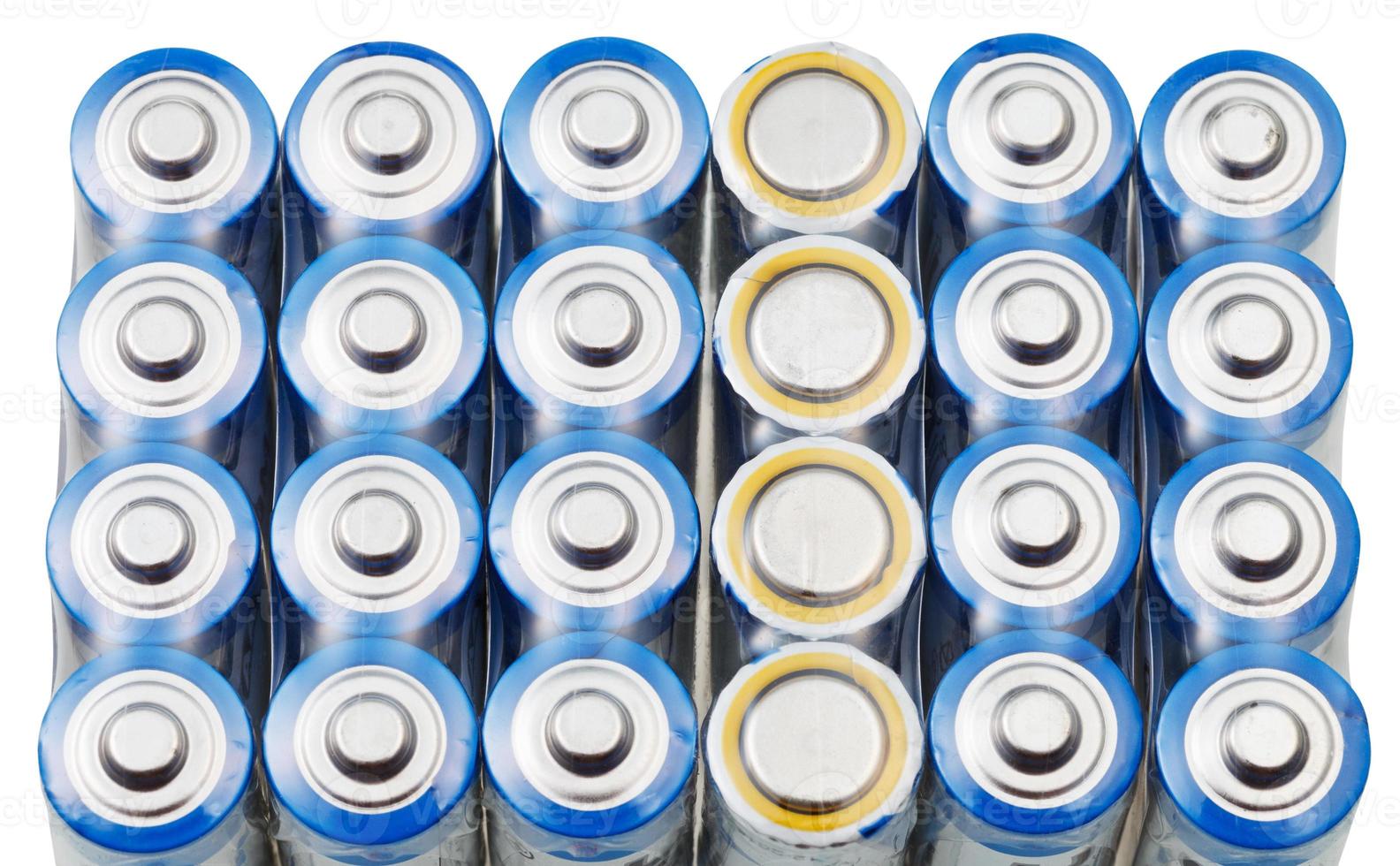 many AA electric batteries close up photo