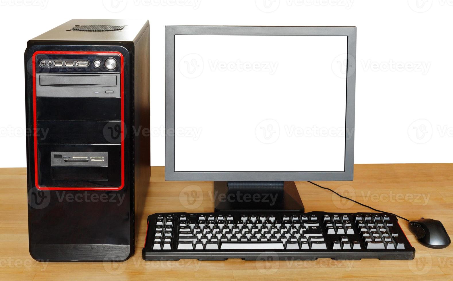 black computer on wood table photo