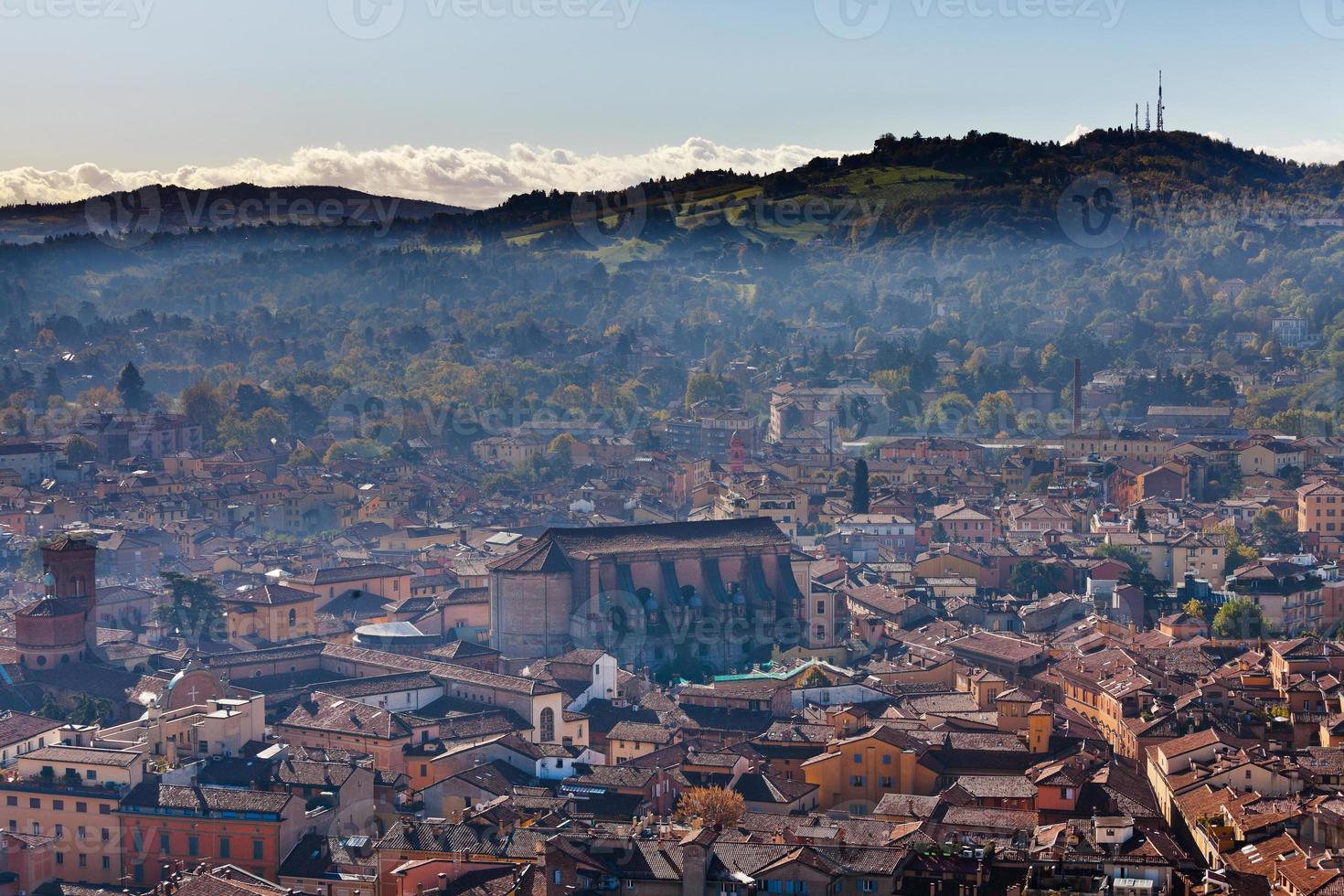 bird eye view from Asinelli Tower on Bologna with mountain photo