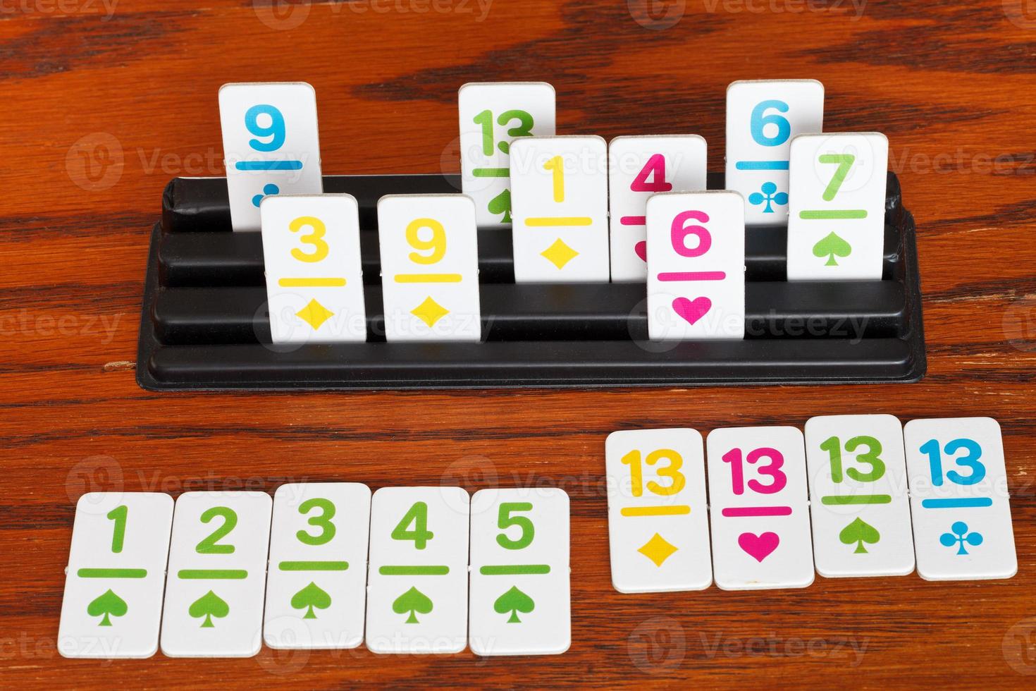 playing in rummy game - run and group of cards photo