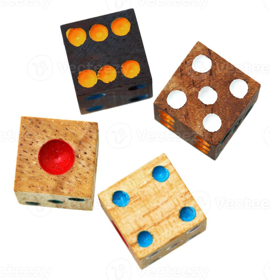 four wooden gambling dices close up isolated photo