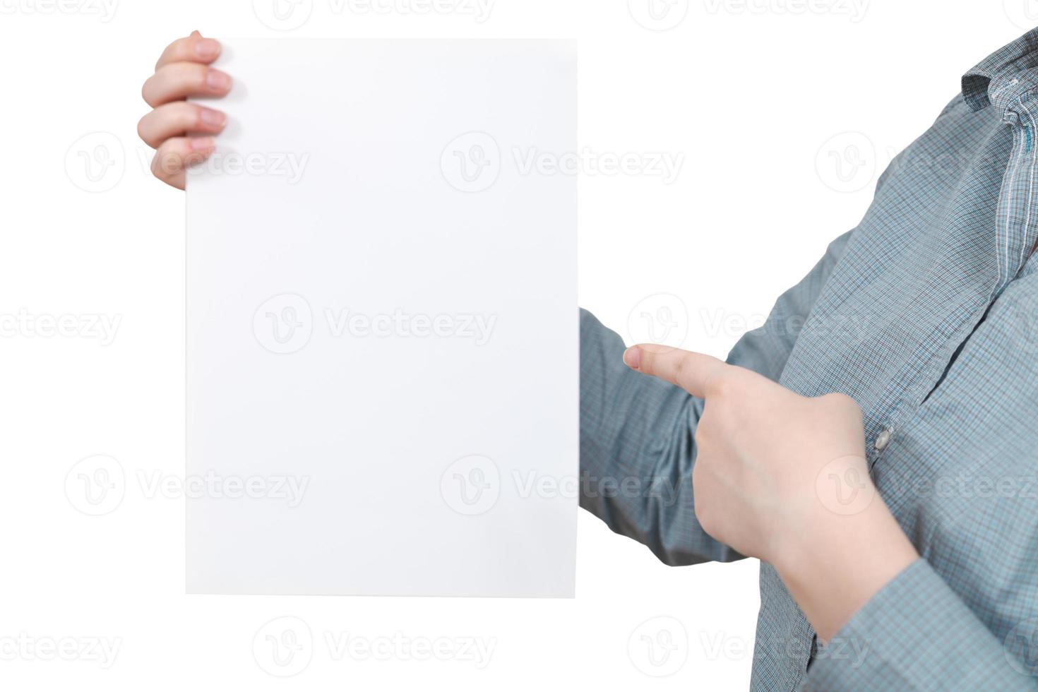 forefinger points on blank paper in female hand photo