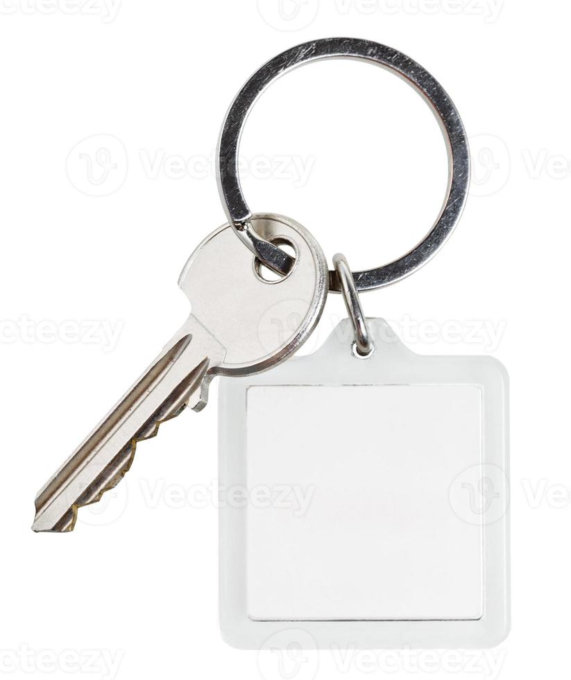 one cylinder lock key and square keychain on ring photo