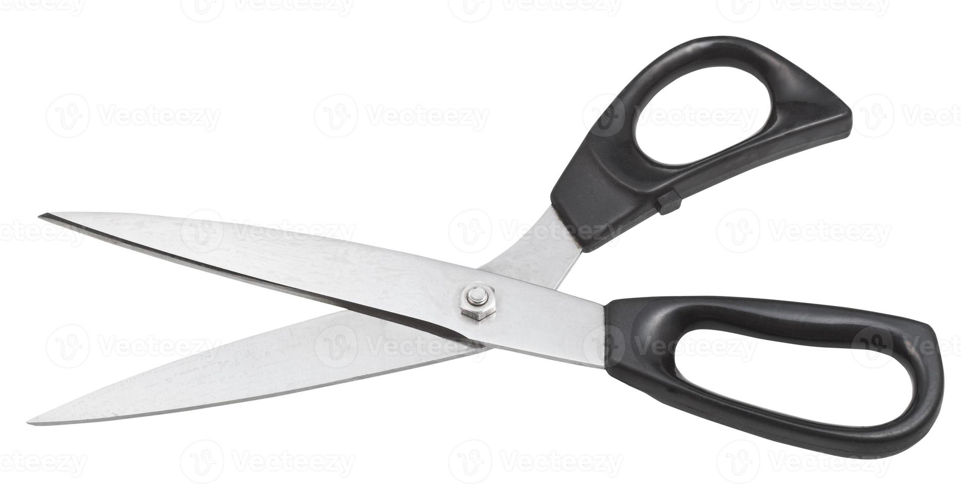 modern tailor shears with black handles isolated photo