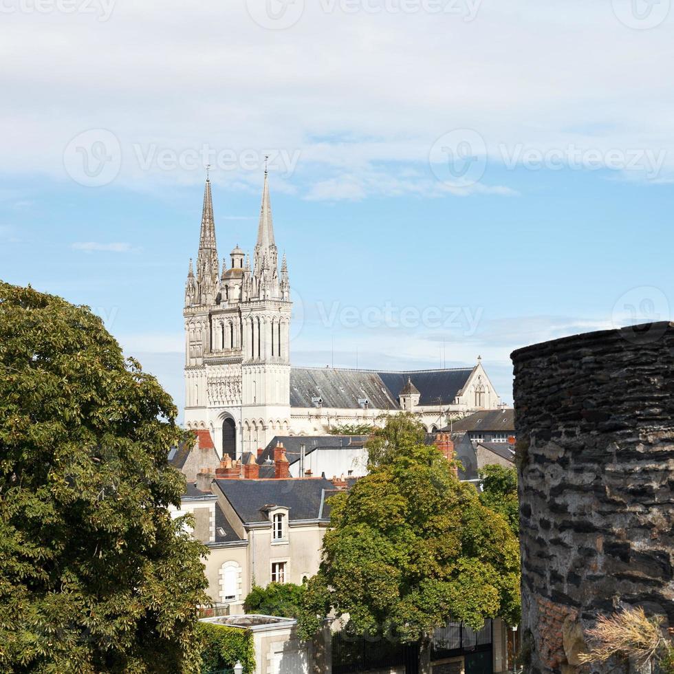 Saint Maurice Cathedral and wall of Angers Castle photo