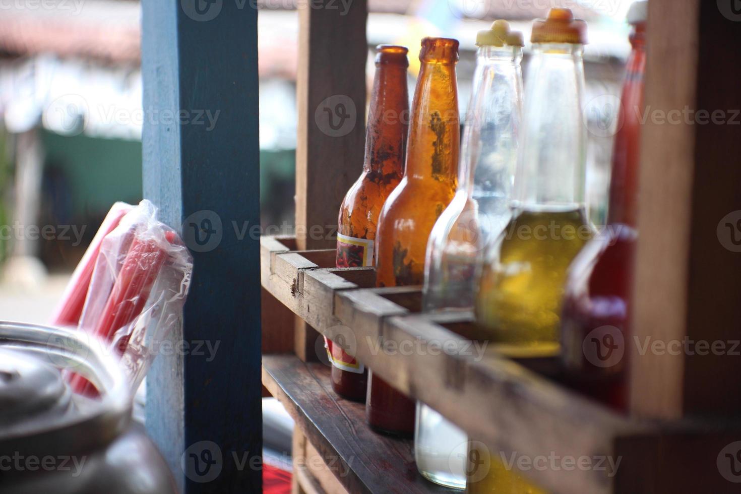 various seasonings of chicken noodles in a glass bottle photo