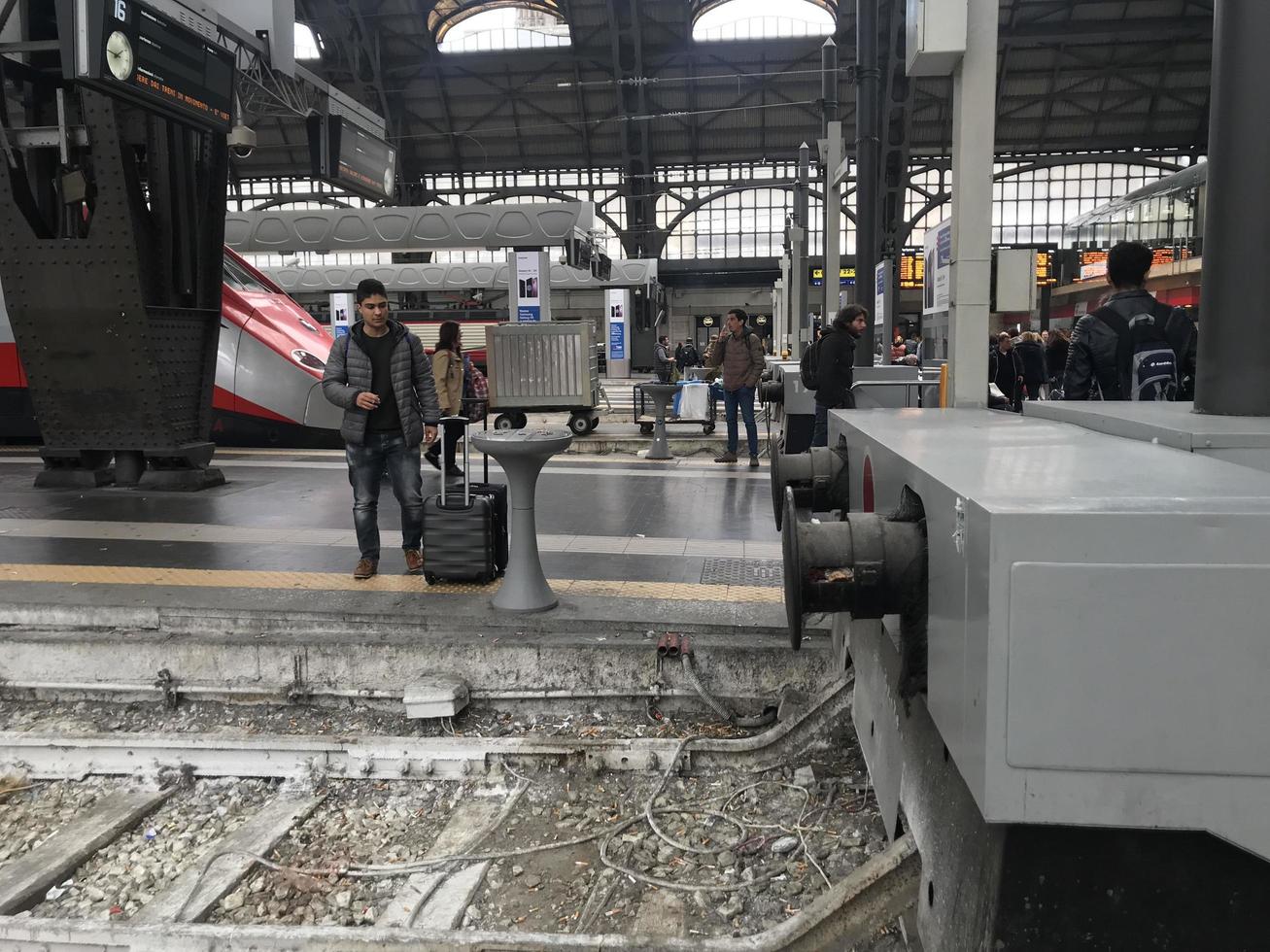 MILAN, ITALY - APRIL 9 2018 - Milan Central railway station crow photo