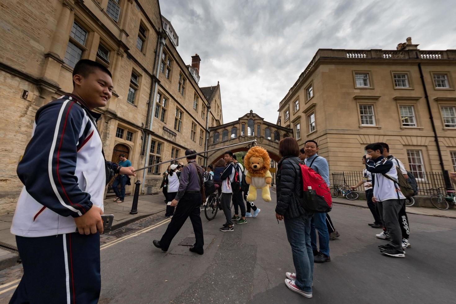 OXFORD, ENGLAND - JULY 15 2017 - Tourists in University town one of most visited in the world photo