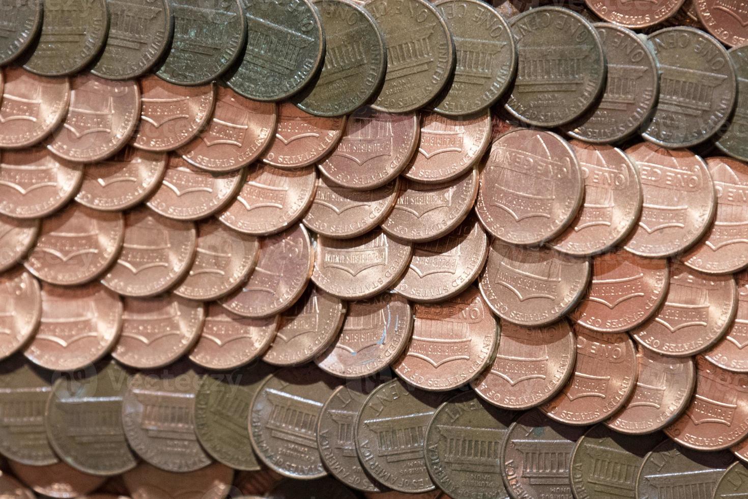 hundreds of one penny coins detail photo