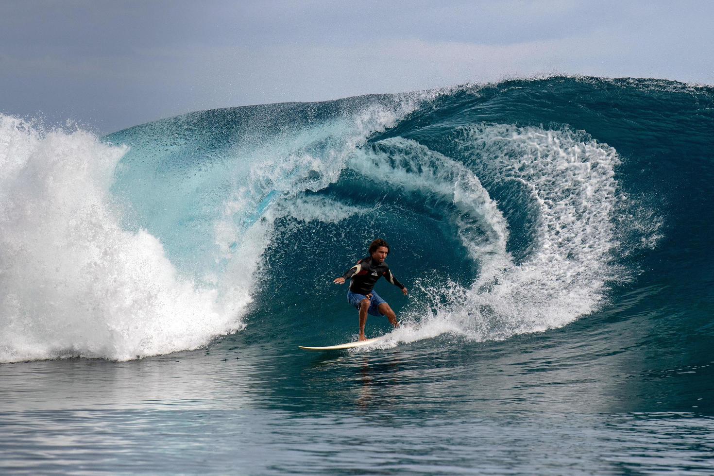 TAHITI, FRENCH POLYNESIA - AUGUST 5 2018 - Surfer training days before Billabong Tahiti Competition at Teahupoo reef photo