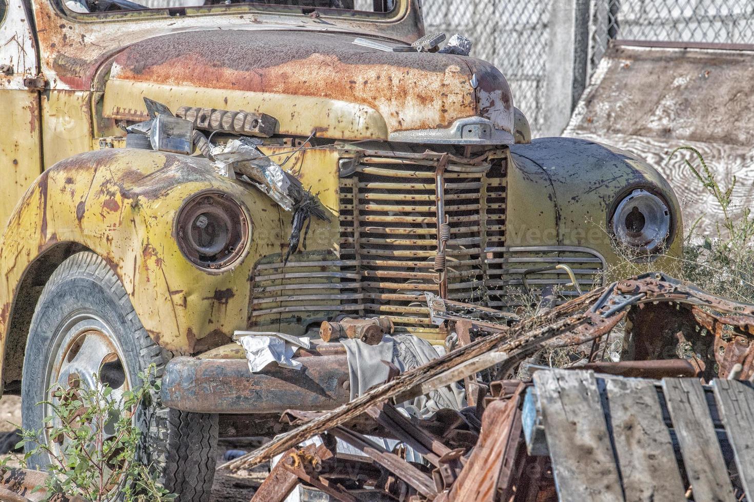 abandoned cars rusted detail close up photo