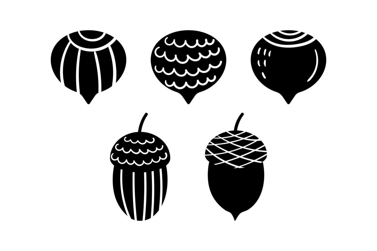 un conjunto de siluetas de avellanas y bellotas para el diseño. ilustración vectorial vector