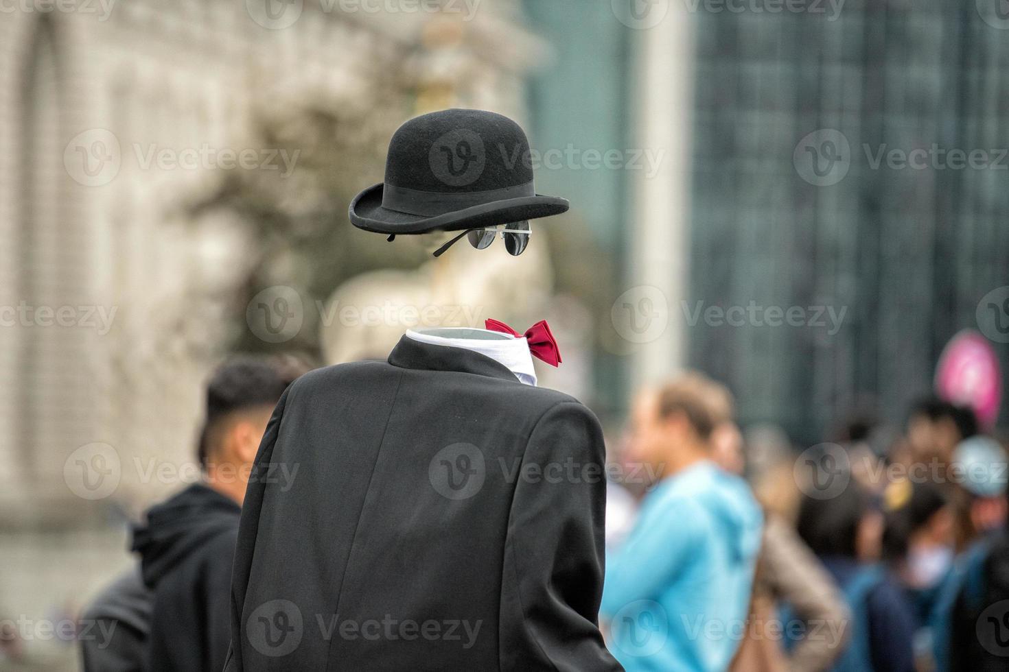 Invisible man in town street photo