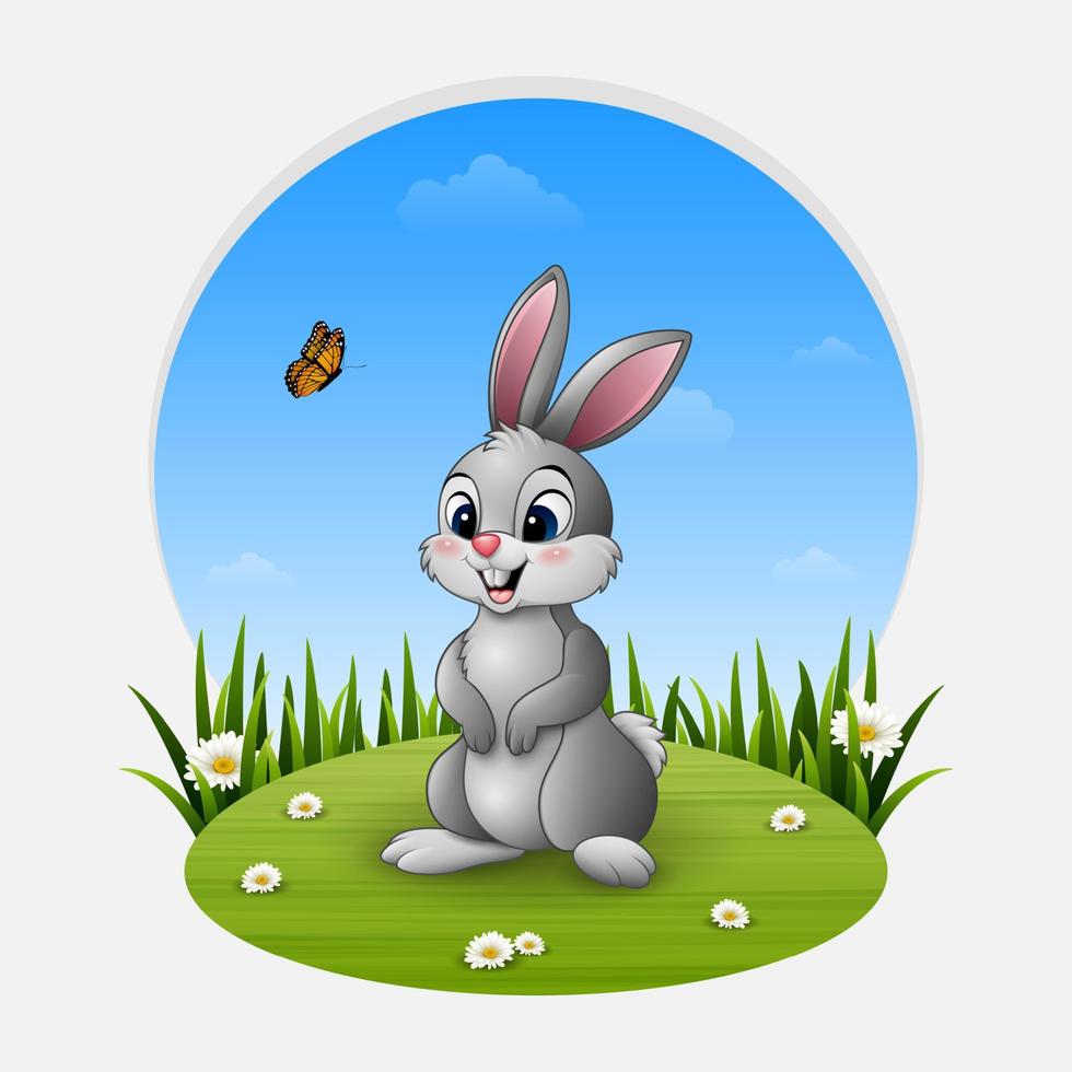 Cartoon happy rabbit standing on the grass vector