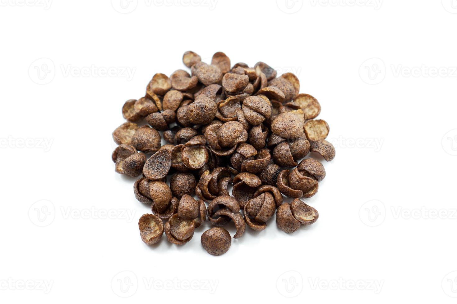 Chocolate cereal for breakfast which is usually added with milk photo
