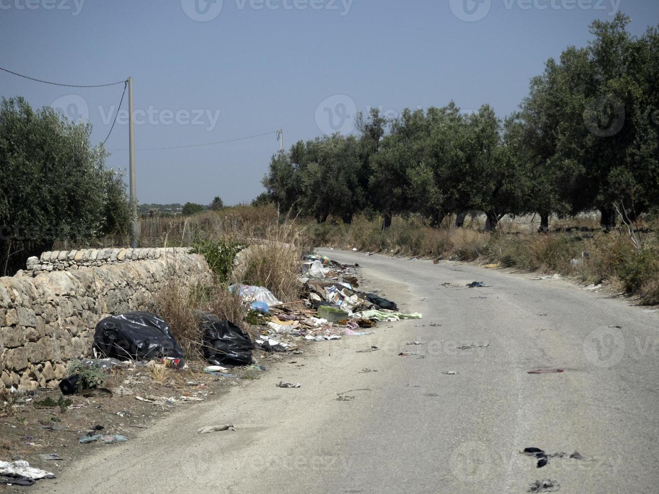 rubbish trash garbage in sicily road photo