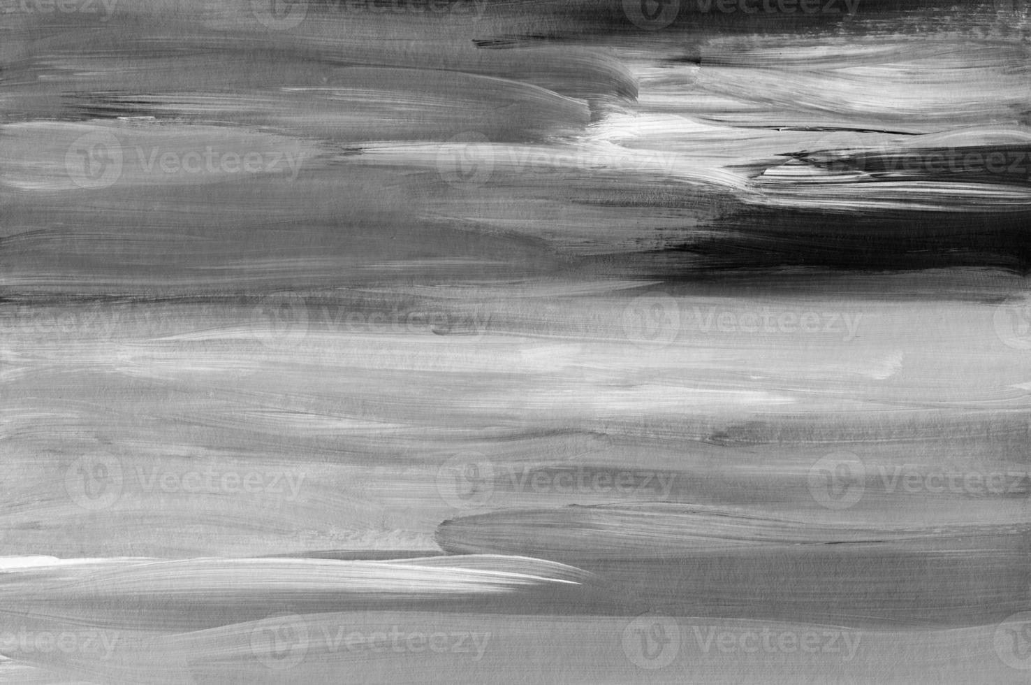 Abstract old black and white background. Neutral monochrome grunge backdrop. Brush strokes on paper photo