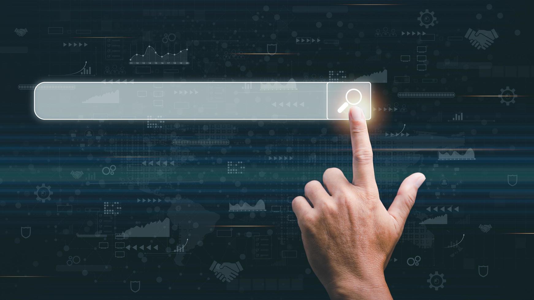 Man's hand pointing at search icon, technology concept researching keywords to find information from online websites, website link discovery and computer communication network, browsing web browser. photo