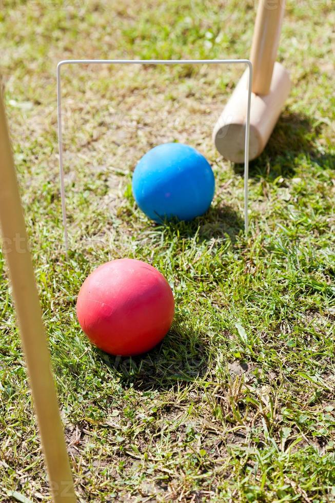 game of croquet on green lawn photo