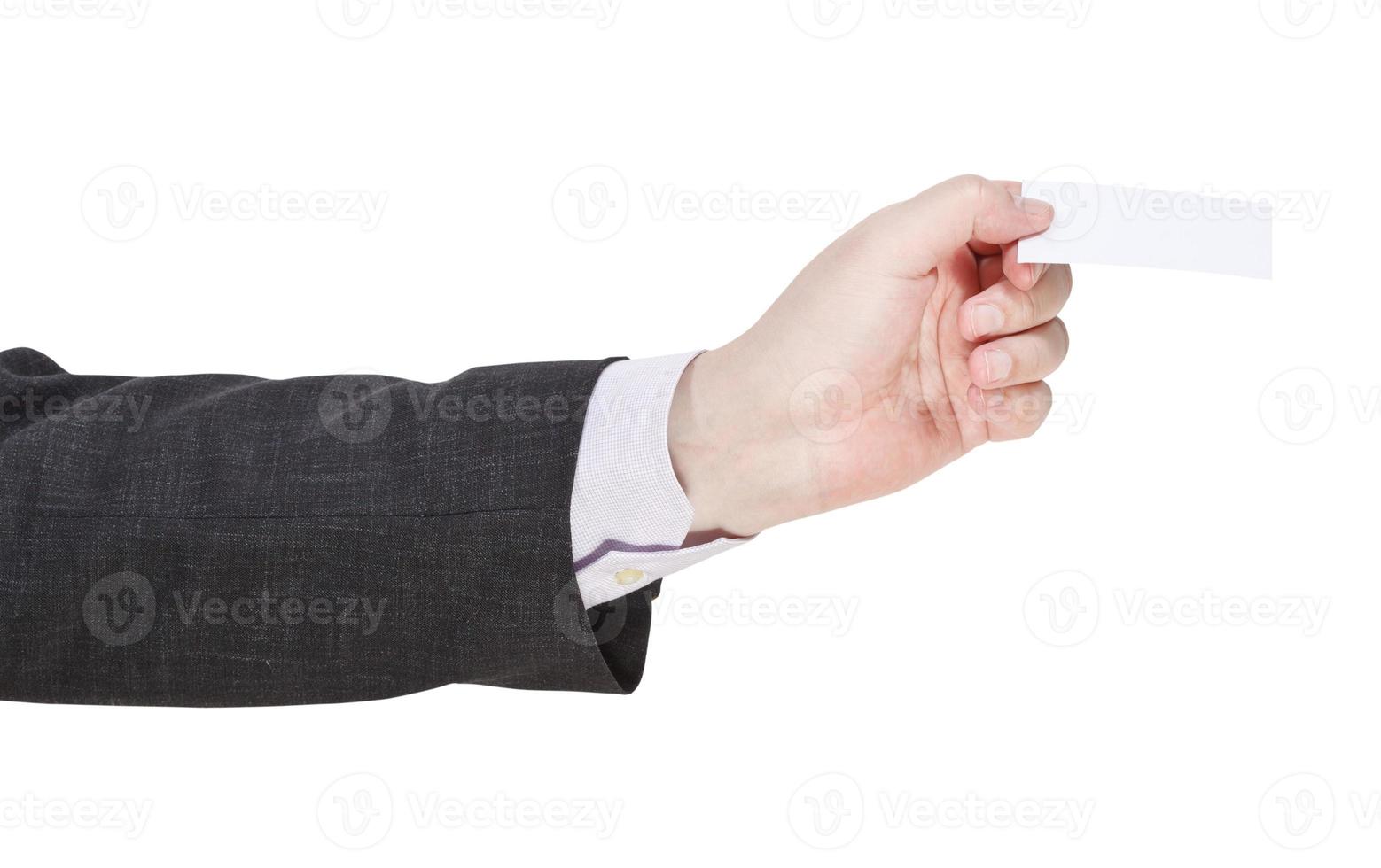 blank business card in businessman hand photo
