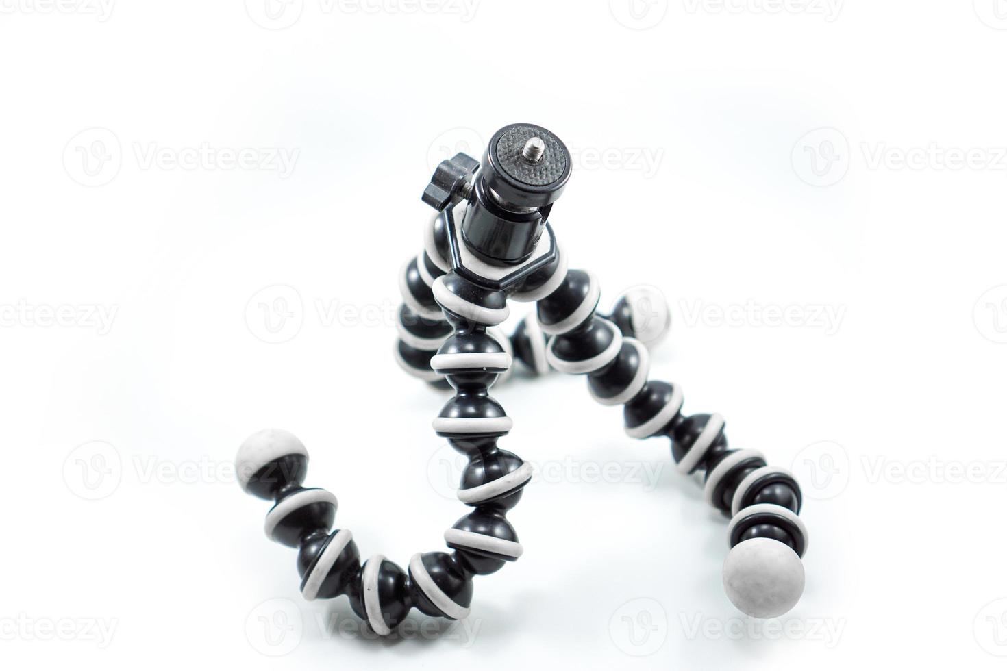 gorilla pod or tripod flexible isolated on white background photo