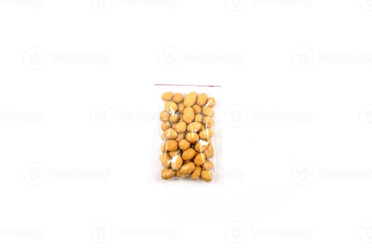 A traditional Indonesian snack made from peanuts coated in egg photo