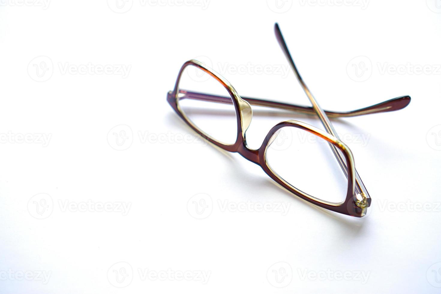 brown eye glasses isolated on white background. photo