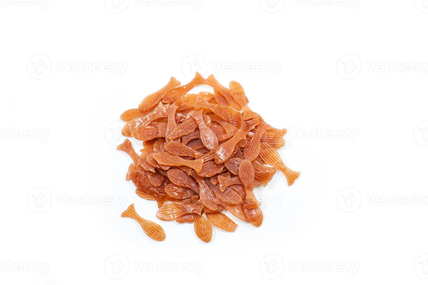 Shrimp crackers that have not been fried or raw in the form of red fish photo