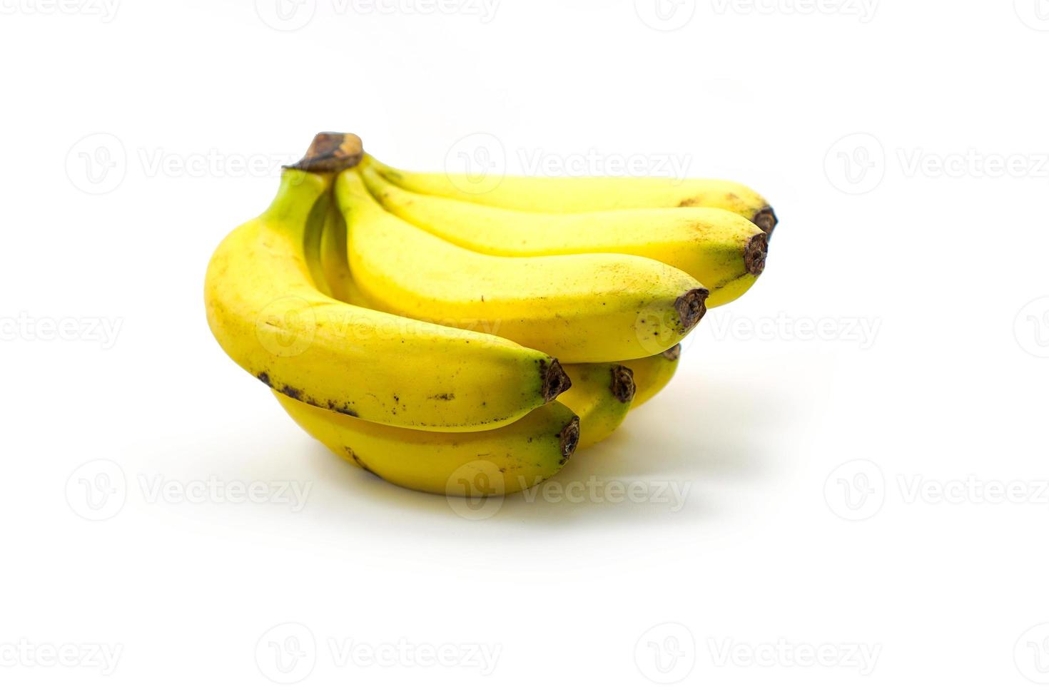 bunch of organic cavendish bananas isolated on a white photo
