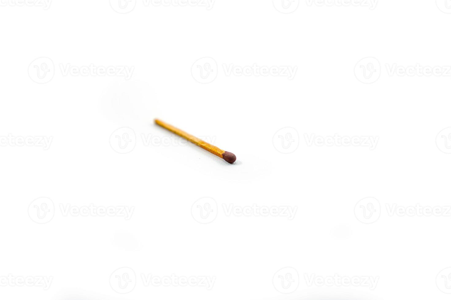 wood match stick isolated on white. Closeup shot. photo