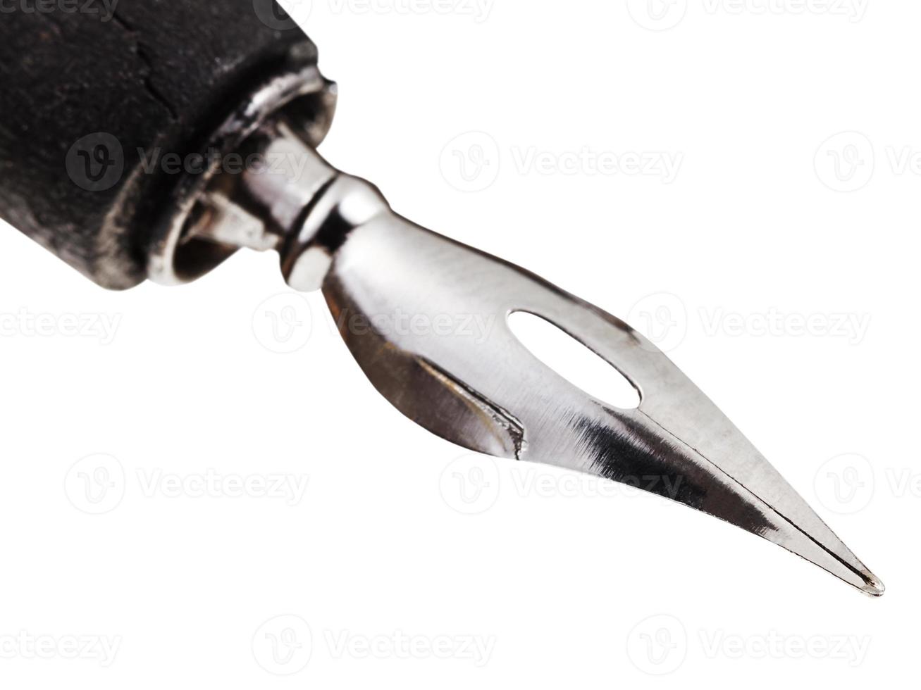 pointed nib of ink pen close up photo