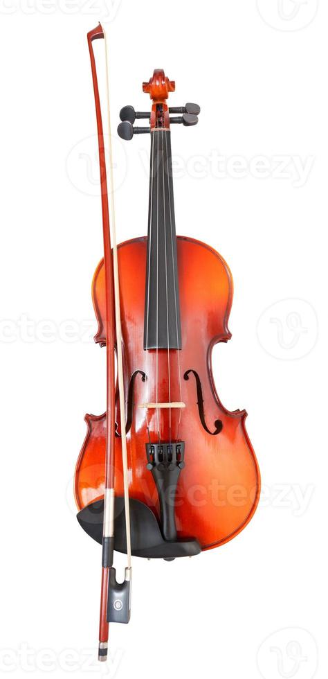 typical wooden violin with transitional bow photo