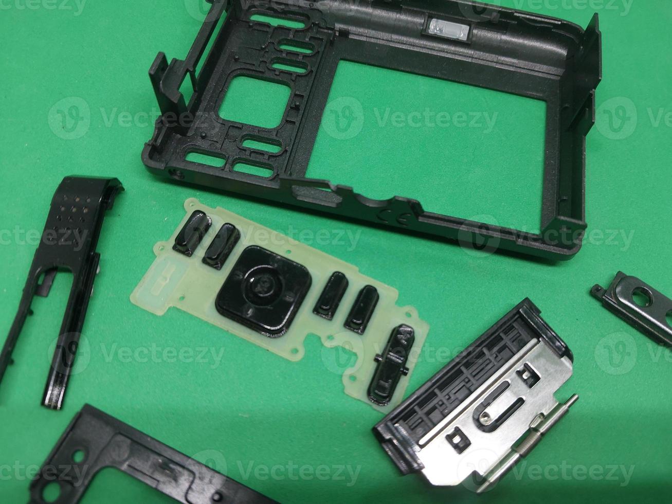 Disassembly and repair of digital camera parts 12043077 Stock Photo at
