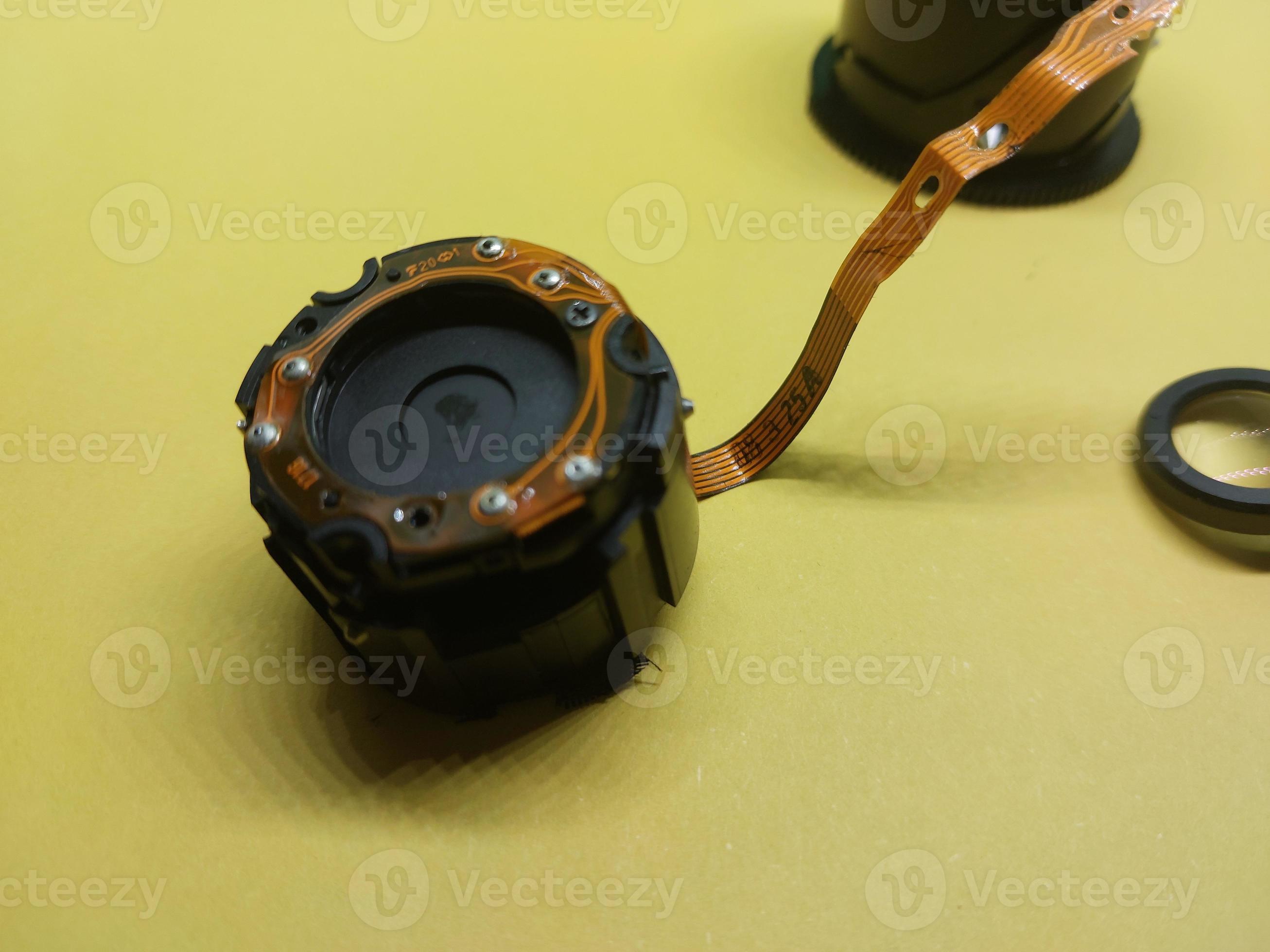 Disassembly and repair of digital camera parts 12043095 Stock Photo at