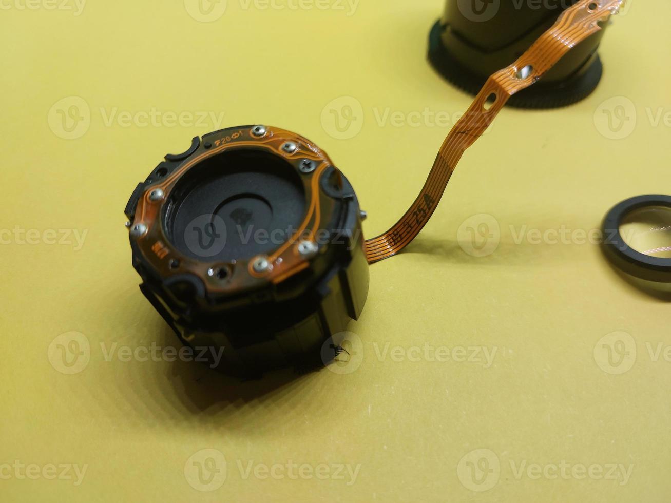 Disassembly and repair of digital camera parts 12043095 Stock Photo at