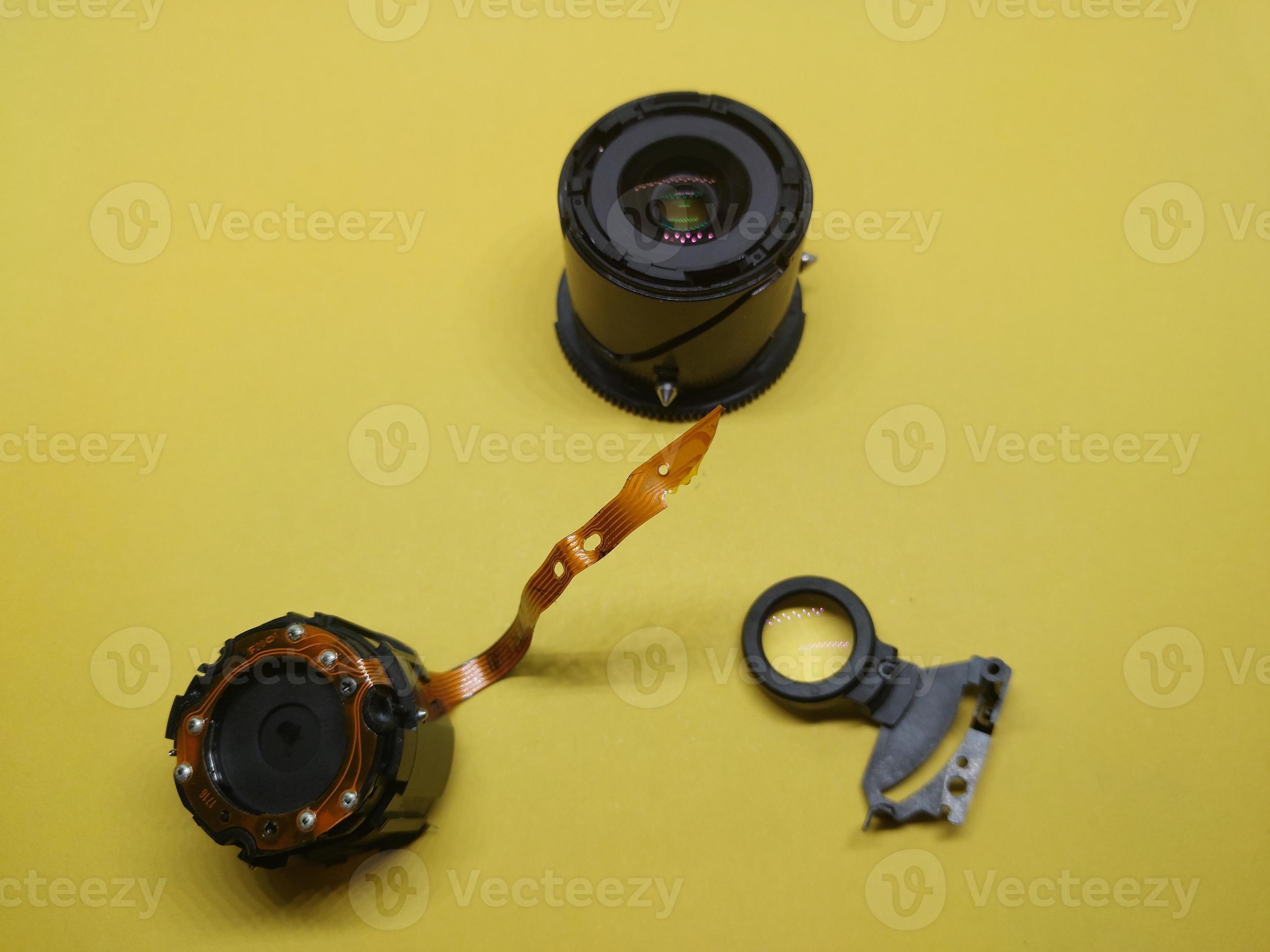 Disassembly and repair of digital camera parts 12043097 Stock Photo at