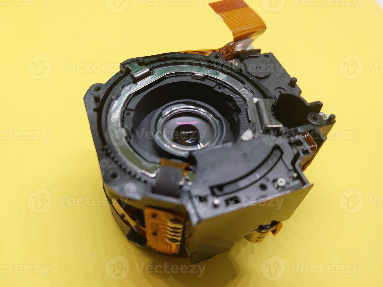 Disassembly and repair of digital camera parts 12043100 Stock Photo at