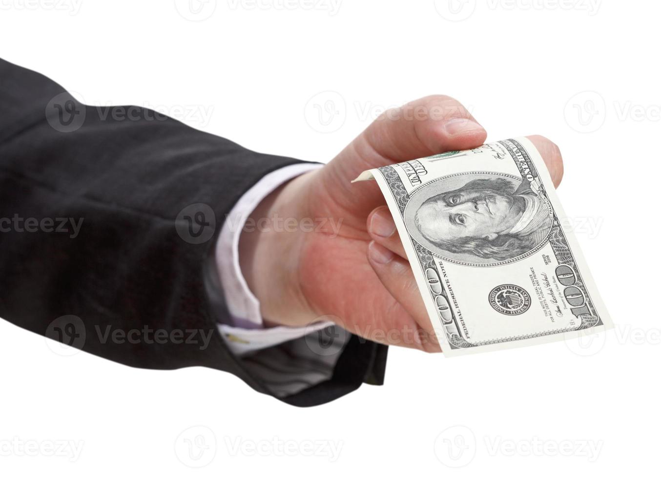 hundred dollars banknote in male hand photo