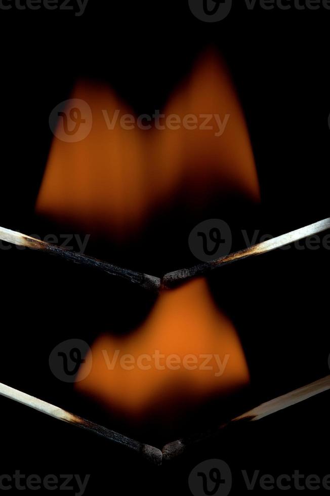 Burning match stick photo