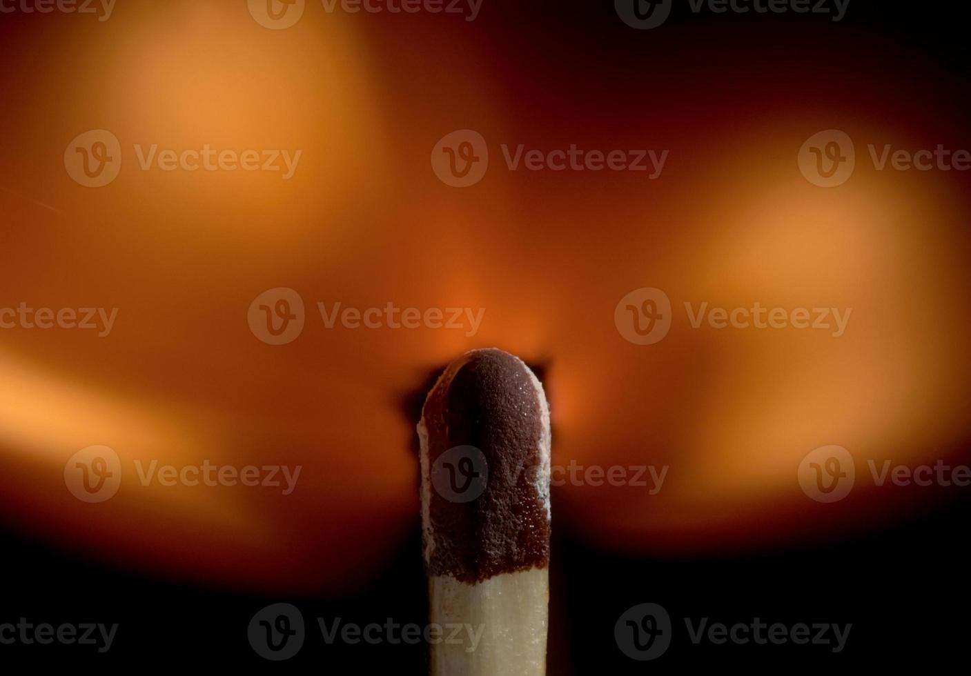 Burning match stick photo