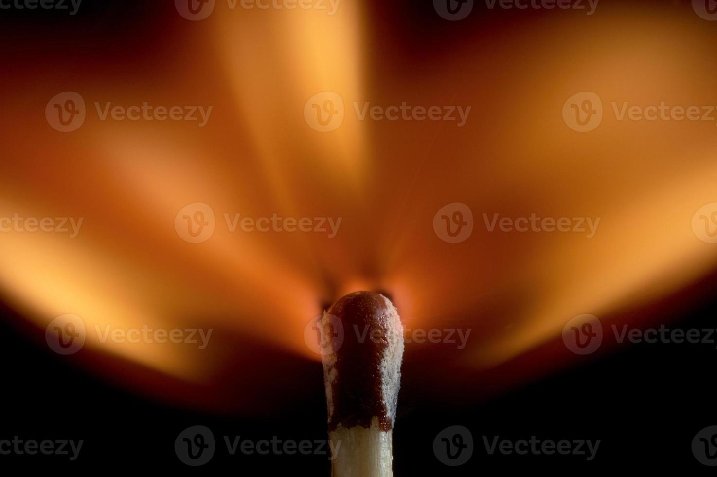 Burning match stick photo