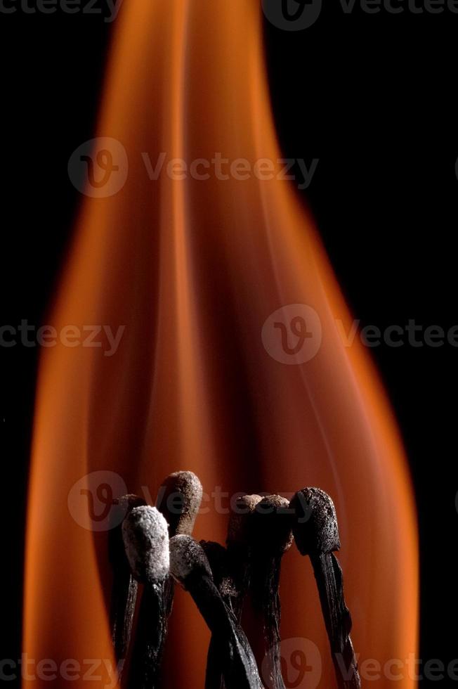 Burning match stick photo