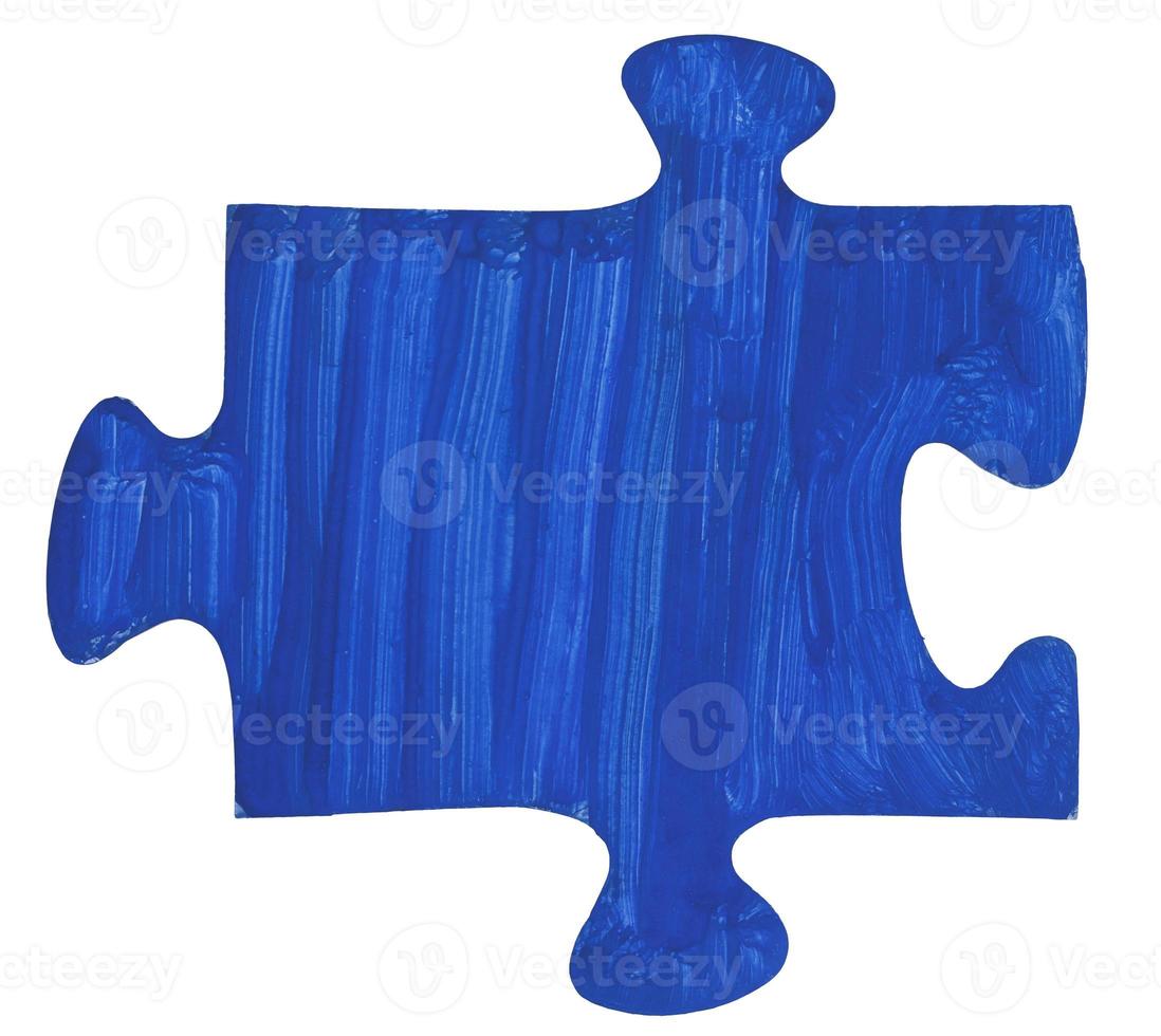 one painted dark blue piece of jigsaw puzzle photo