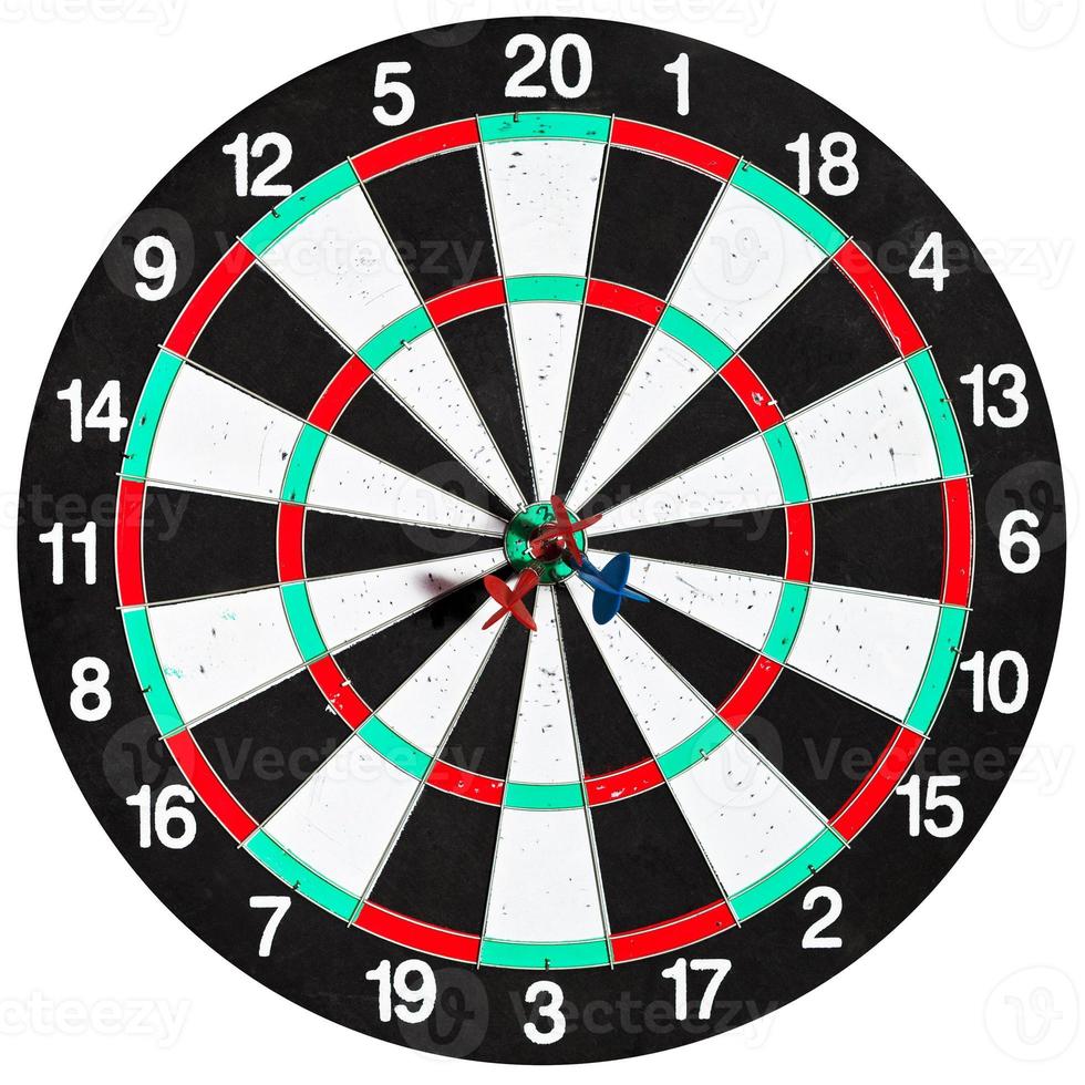 used dart board with three arrows photo