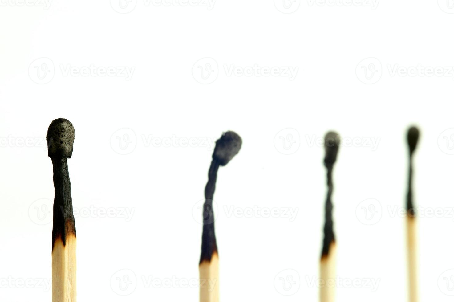 Four matchsticks burned photo