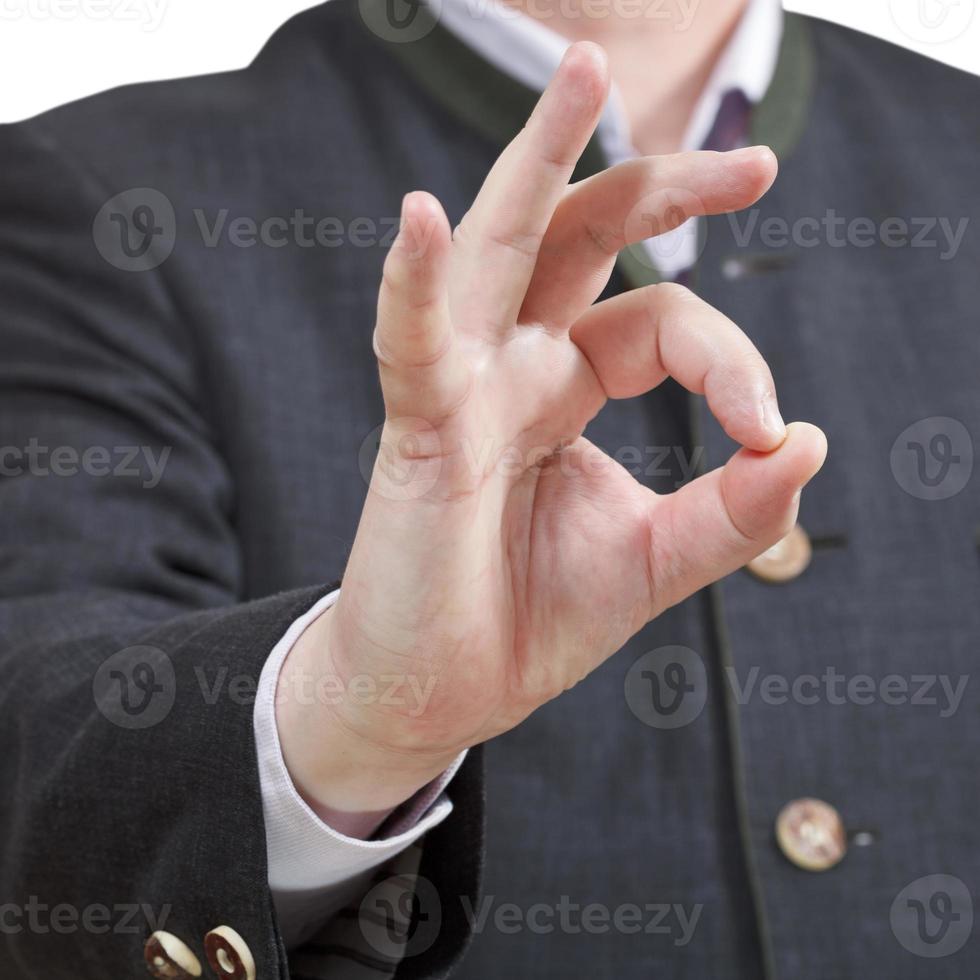 businessman shows Okey sign close up photo