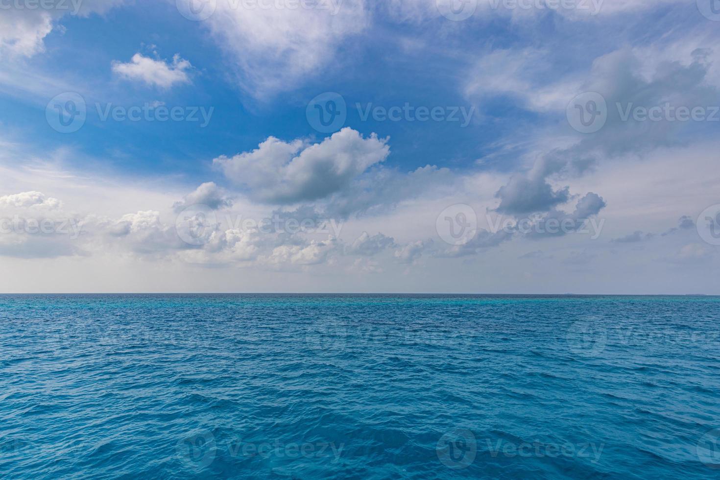 Relaxing seascape with wide horizon of the sky and the sea. Ocean nature, marine life. Seascape with sea horizon and deep blue sky background photo