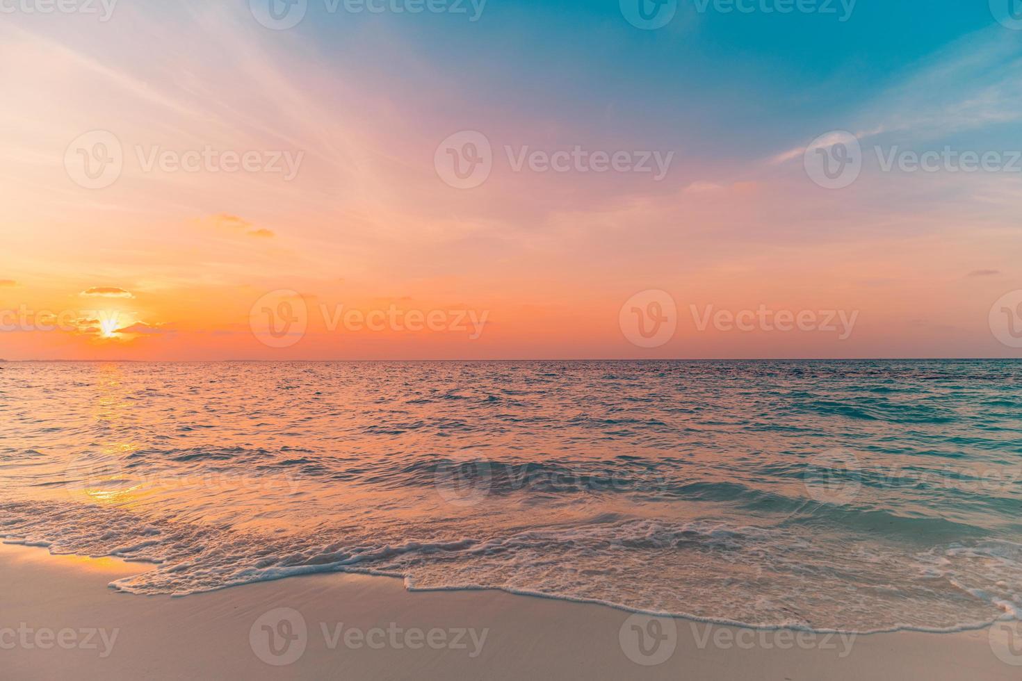 Closeup sea sand beach. Beautiful beach landscape. Inspire tropical beach seascape horizon. Dreamy sunset sky calm tranquil relax sunset summer mood. Positive energy, meditation summer tropical island photo