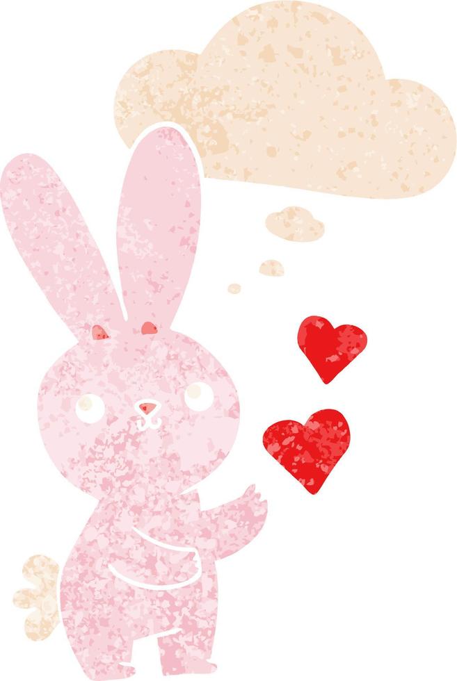 cute cartoon rabbit with love hearts and thought bubble in retro textured style vector